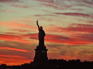 Ms. Liberty at Sunset, shot from a Norwegian Cruise Line outbound ship outward bound from New York Harbor