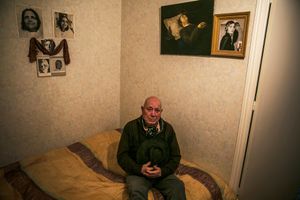 Collecting his thoughts in his bedroom.