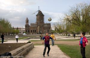 Armenia  Gjumri, boys play football before the cathedral  which was severely damaged during the earthquakein 1988 © Bert Spiertz