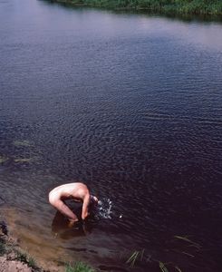 Bather in the Narew River, Podlasie, Poland.