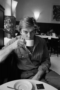 Young Man Sipping Coffee
