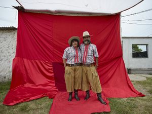 Devotees couple elegantly dressed for the chamamé dancing in the El Campito de la Carolina gathering space