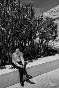 Japanese man in thought at Getty Center, Los Angeles