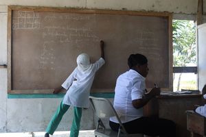 Trou-du-Nord, Haiti, février 2018, Elève au tableau