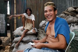 Muslim scavenger about to do drugs.