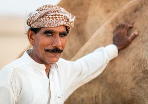 Camel Herder in Abu Dhabi