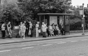 People waiting at bus stop, Enfield