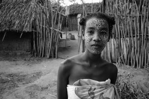 Woman with mango mask