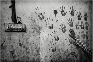 Wall stained with the Children’s hand marks.