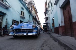 Blue Car on Blue Wall