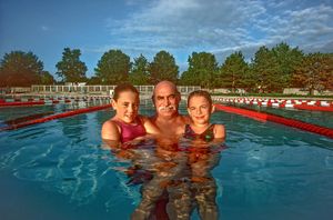 Sam Kravitz with granddaughters, Maxine and Margo.