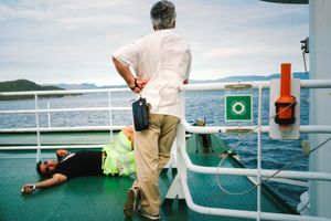 Resting on deck.