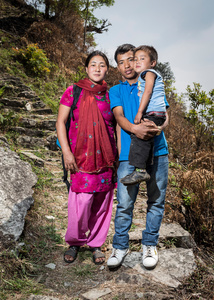 Lait Limbu (25) with his wife Anita (25) and his son Anket (4)