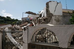 The totally collapsed house where Ciro and his two little brothers were rescued.