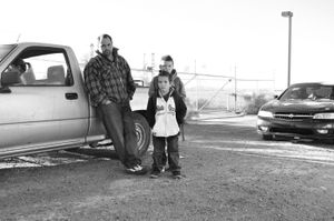Victor, Dylan and Steven wait for the school bus. © Joseph Sorrentino