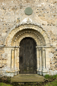 Exquisite Romanesque detailing on a door at St. Margaret's, Hales