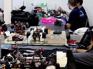 Racers Repairing their cars
