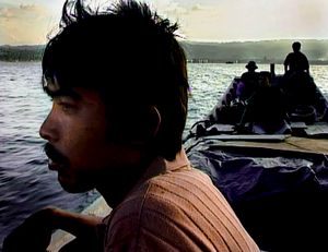 At sea, off Banda Aceh, Indonesia (2005). Fishermen - out for the first time since the Tsunami.