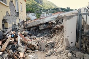 The totally collapsed house where Ciro and his two little brothers were rescued.