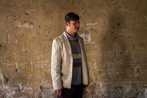 Portrait of young Afghan refugee