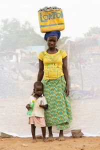 A. Catherine: Age 29 with her daughter Jessica: Age 2. Working in quarry for 11 years.