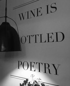 Wine is a bottled Poetry