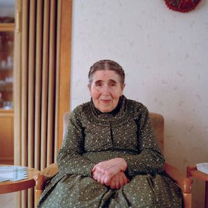Katharina Hofmann in her home, Catholic Marburger Land, 2015. From the series: The last women in their traditional peasant garbs