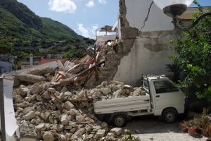 The totally collapsed house where Ciro and his two little brothers were rescued.