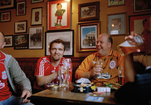 Liverpool football supporters from Norway enjoy a drink in a pub in Anfield, before the match with Charlton Athletic. Liverpool. 13 May 2007.