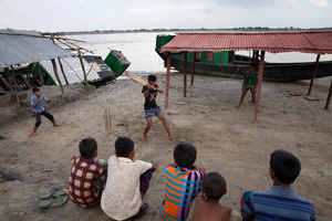 Children are playing cricket in Shyamnagar, Satkhira, Bangladesh
