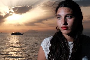 Denise Di Carmine, my daughter, Capo Vaticano (Calabria, Italy) with the Stromboli vulcano in the background - 2016