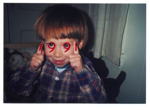 1990, front, tipped-in photograph/ drugstore print, with added marker ink.