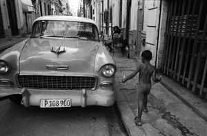 a boy and a car