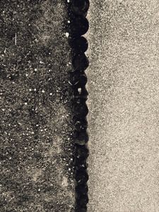 Asphalt, wooden Posts and Grass
