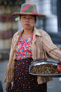 Lady selling fried grasshoppers, Yangon