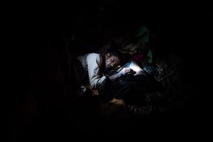 The Rohingya Refugee Crisis. A severely sick refugee is lying in a tent, camp near Ukhia, Bangladesh.