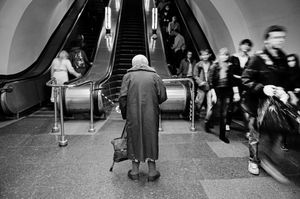 'Stockings Askew, Begging for Heat From Metro Passengers'