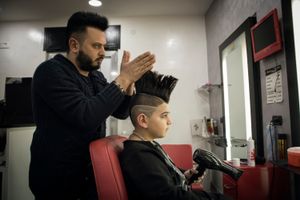Luciano Ferrara, 8 years old, in the living room of his house in Frignano.