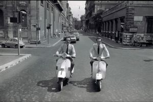 Men on Scooters
