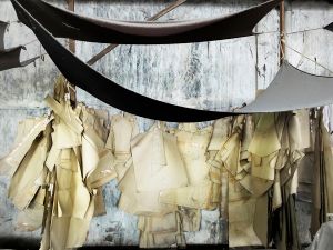 Paper patterns hang in a manufacture in Central Java.