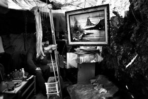 Jorgos 62 years from Greece old living in a park under Akropolis since 6 months. He lost his job and couldn’t any more pay his rent.This cave is his house, he says. Athens, Greece Enri Canaj