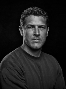 Portrait of a man with a cotton sweater.