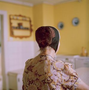 Monika Roelke with her hood, Catholic Sorb, Lusatia, 2017. From the series: The last women in their traditional peasant garbs
