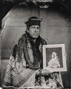 Talking Tintype, Andy Everson, Artist, Citizen of the K’ómoks First Nation, holds a Curtis portrait of his grandmother who played Princess Naida, 2017, from the series Critical Indigenous Photographic Exchange, Seattle Art Museum.
