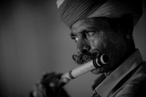 Turban, mustaches and flute
