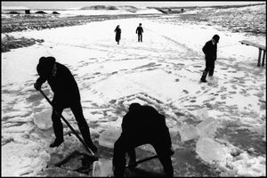 © George Webber - Men breaking ice, 2000