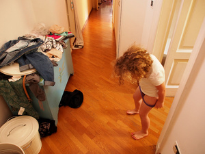 Margot trying to get dress by herself under my supervision