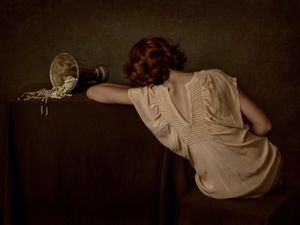 Woman with Vase and Pearls