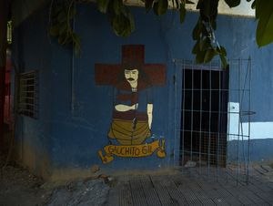 Private house of an elderly devotee who painted  by himlself the icon of Gauchito Gil on the main facade in Corrientes Capitale