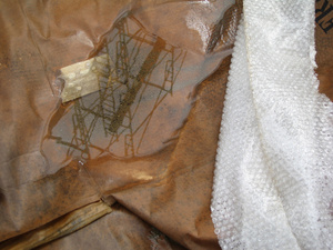 building scaffolding reflection / brown paper